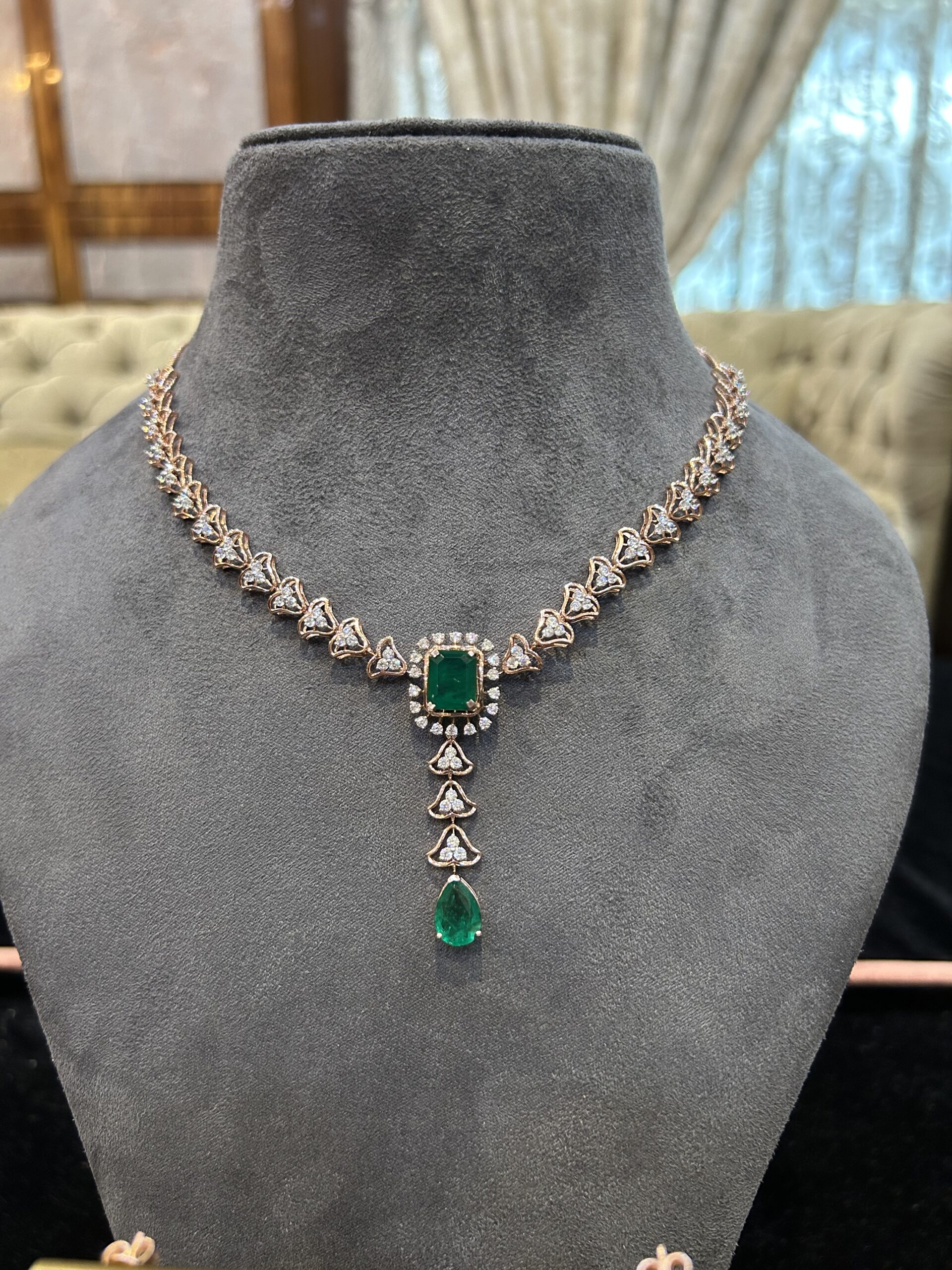 Elegant emerald and diamond necklace