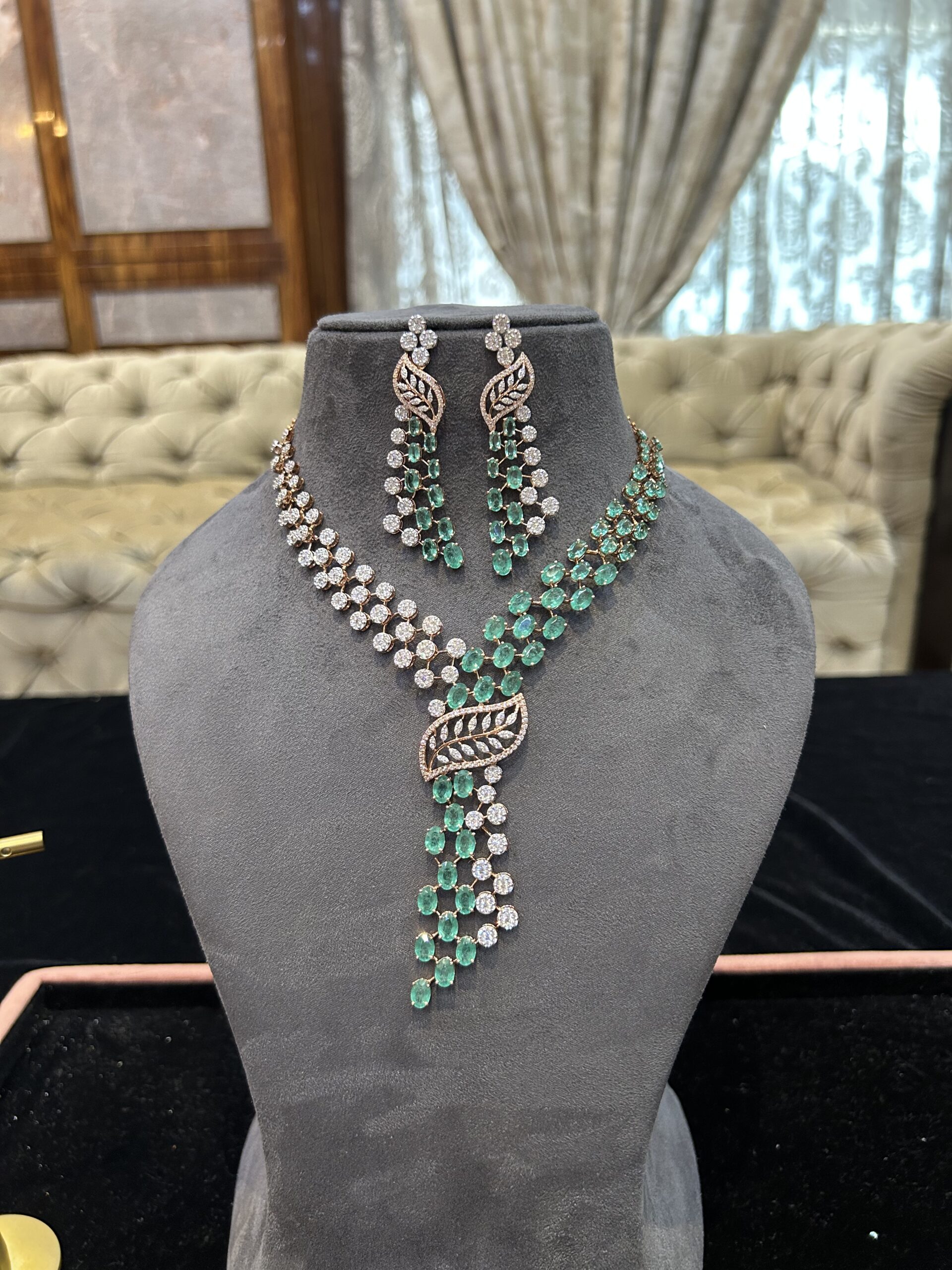 Elegant emerald necklace and earrings set